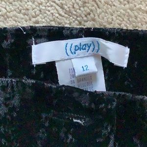 Women’s black pants.